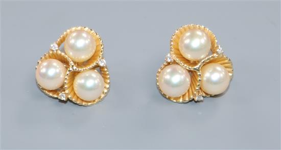 A pair of 14ct gold, pearl and diamond earrings (pierced and clip fitting)